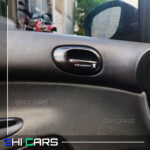 برچسب روی دستگیره داخلی پژو 207 و 206 - شیکارز